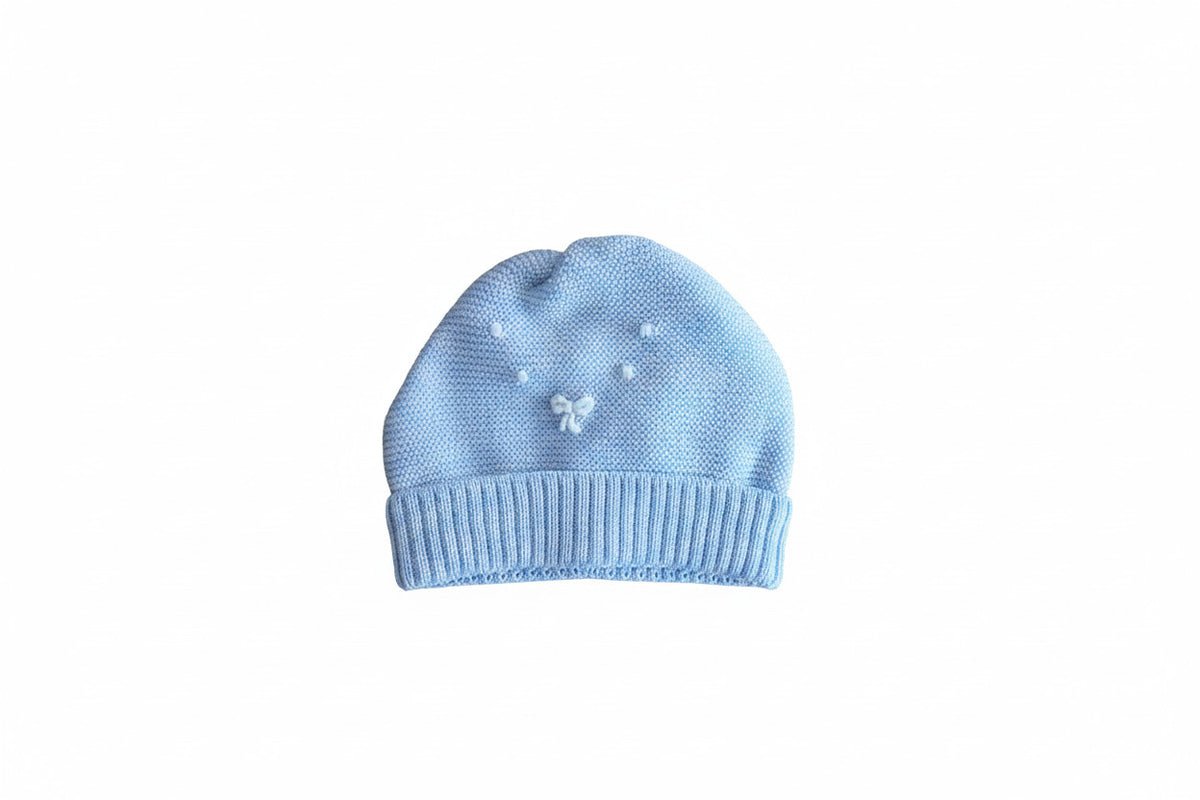 Cappellino neonato in maglia azzurra con fiocchetto – Baby Lord